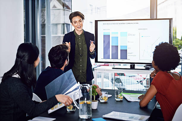 Cropped shot of a young businesswoman giving a presentation in the boardroom Cropped shot of a young businesswoman giving a presentation in the boardroom
