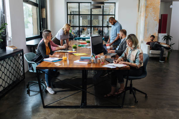 Co-working office space with a group of young people Co-working office space with a group of young people