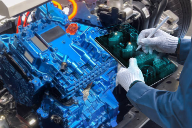 A technician wearing gloves uses a digital tablet to inspect an electric vehicle motor, showcasing advanced technology and diagnostics.